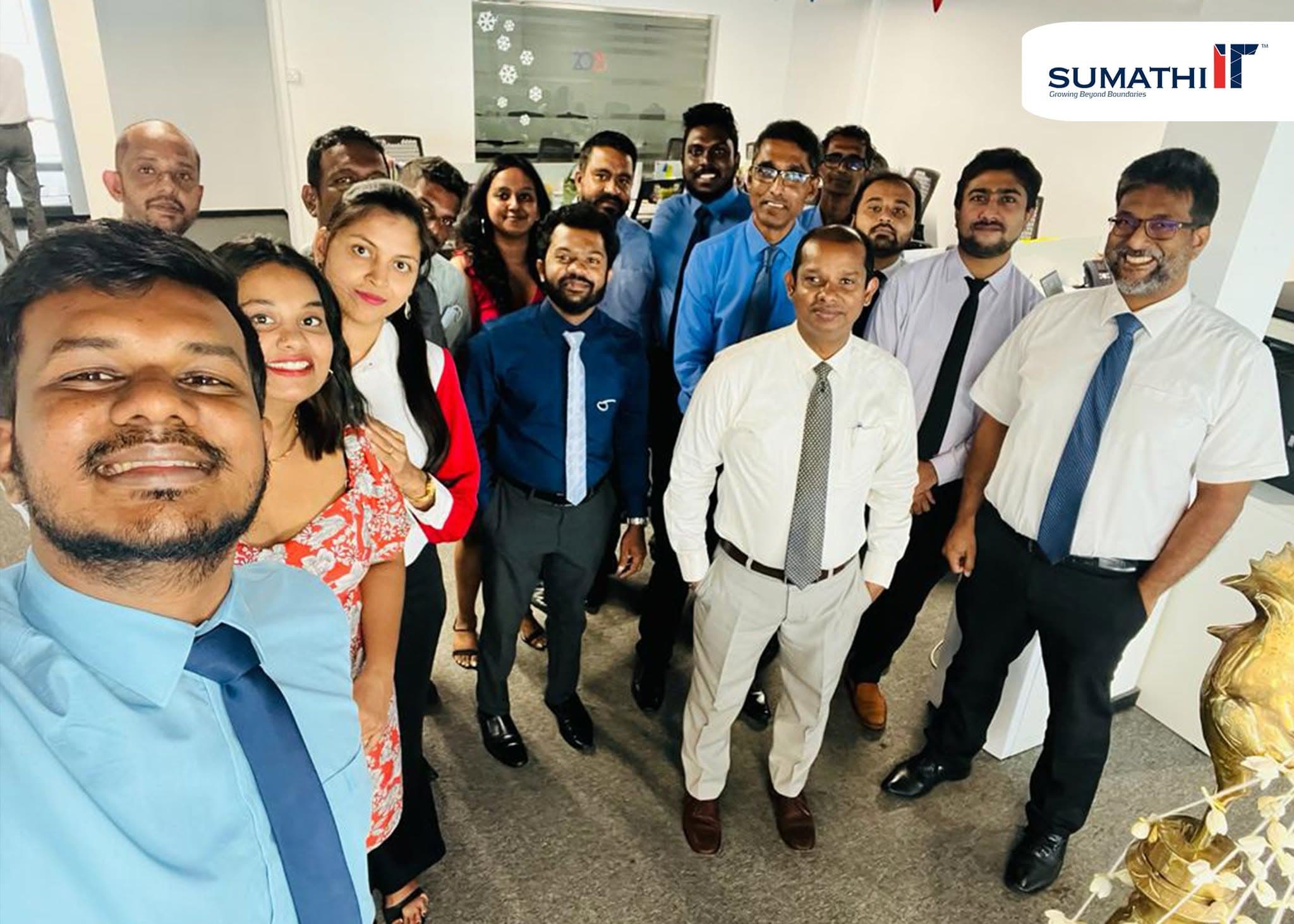 Sumathi IT engineers collaborating on a client deployment